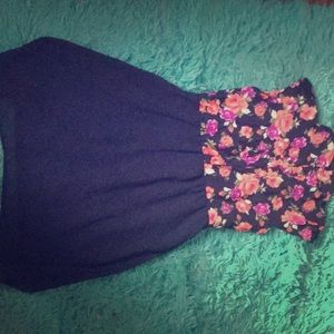 A blue flowered dress with buttons and a collar